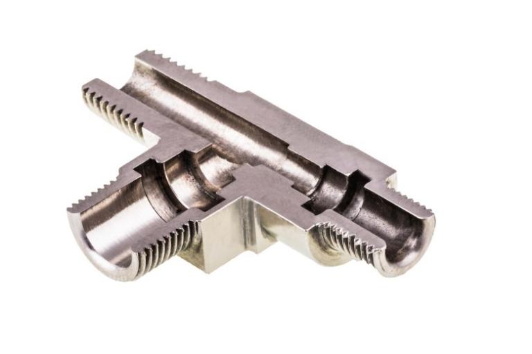 Cut away stainless steel tee fitting